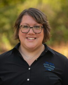 Melissa Keller, Executive Director of the Mid-Atlantic Auto Care Alliance (MAACA), smiling in an outdoor portrait while wearing a black MAACA-branded shirt.